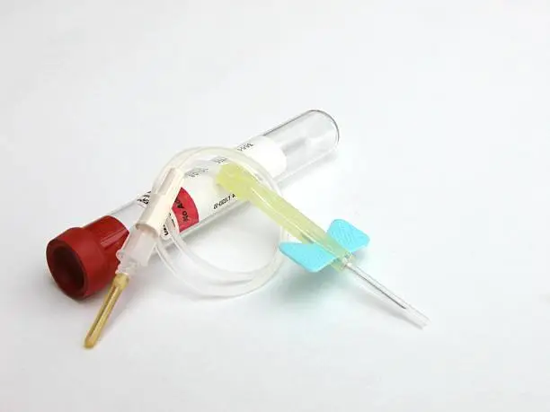 This is a 'butterfly' shaped needle used to draw blood from a patient. The other end is inserted into a vacuum sealed test tube. Both items are sterile and unopened.
