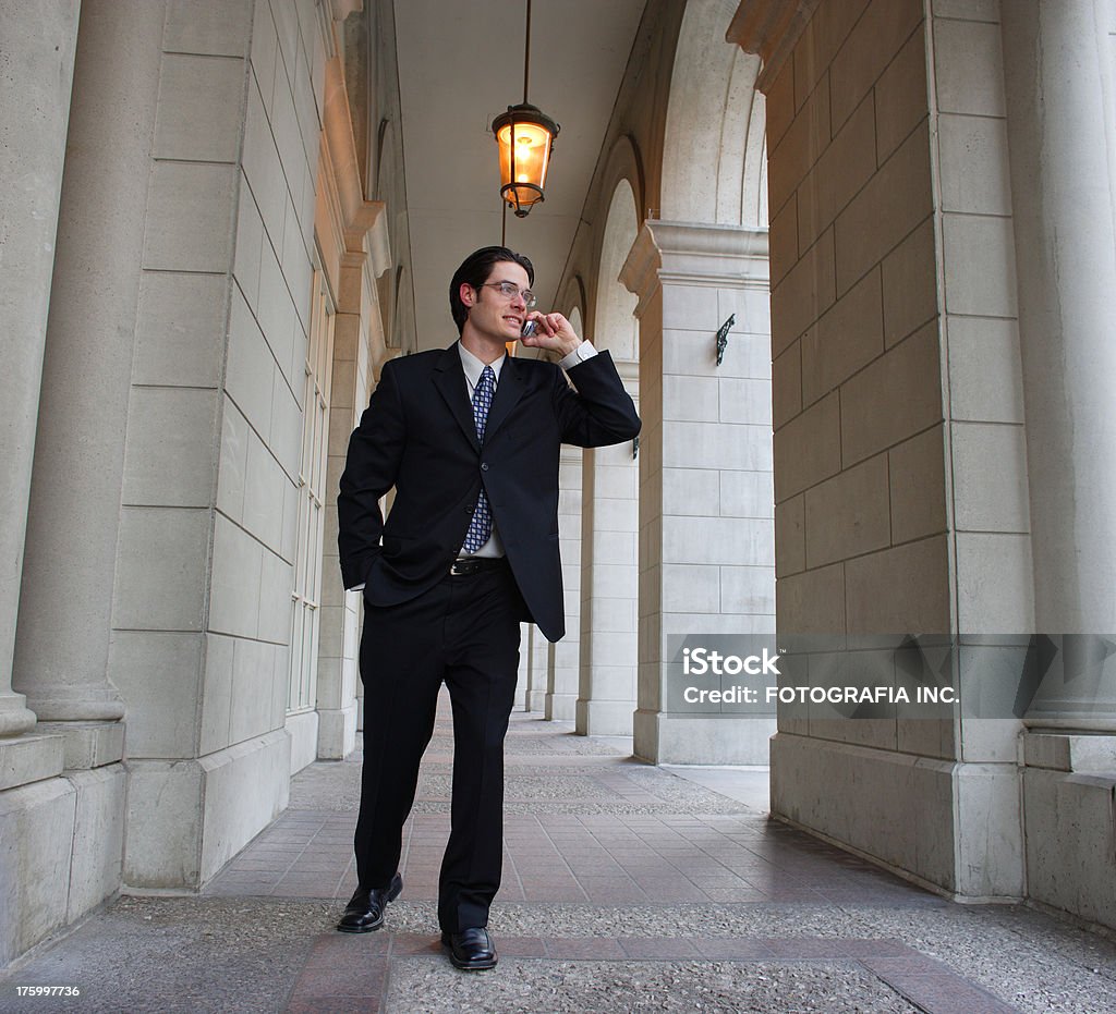 Young Man 2 Young man with cell phone walking on the street Accessibility Stock Photo