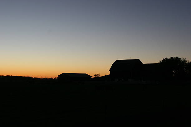 istock farmhouse in silhouette 175998923