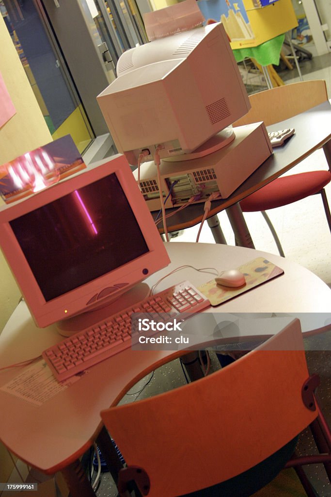 Computer desks - Internet Coffeeshop Two computer desks in an internet-coffeeshop. Architectural Feature Stock Photo