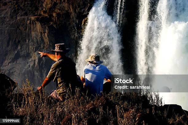 Supervisionar Cataratas De Victoria - Fotografias de stock e mais imagens de Cidade de Victoria Falls - Cidade de Victoria Falls, Turista, Alto - Descrição Física