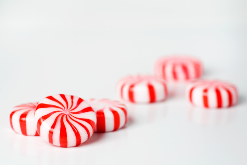 peppermint candies on white background