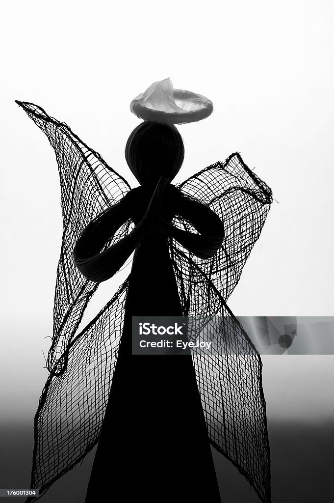 Angel Silhouette con preservativo alone - Foto stock royalty-free di AIDS