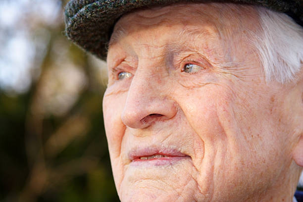 Aged Gentleman Series An elderly gentleman with a twinkle in his eye.See also: glengarry cap stock pictures, royalty-free photos & images
