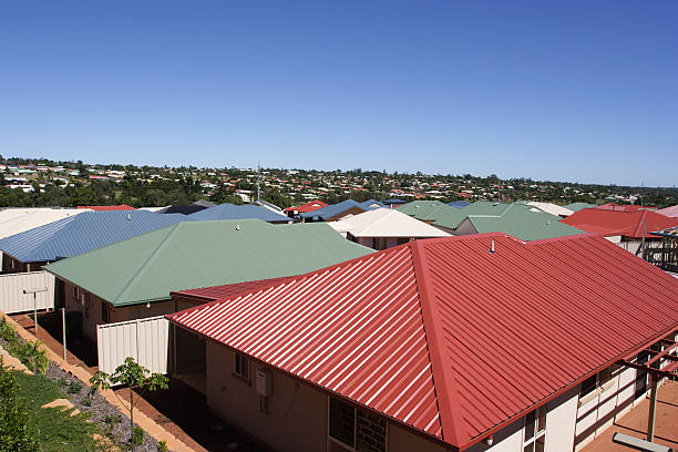 An overhead shot of metal roofs in crowded suburbia stock photo
