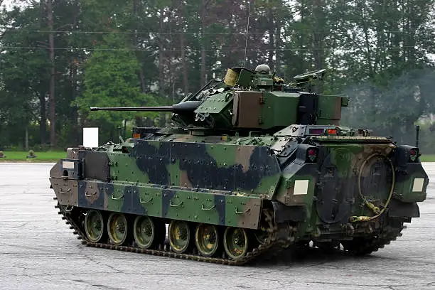 Photo of M2 Bradley Armored Fighting Vehicle on concrete yard