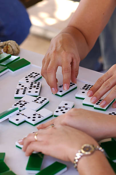 istock girls plaing domino 176001695
