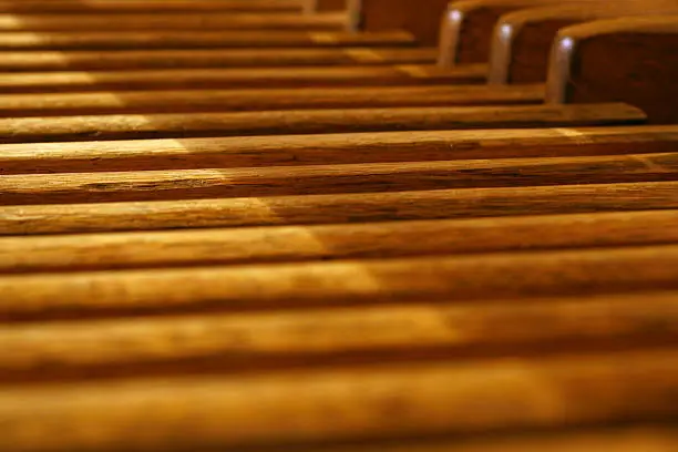 Detail of the wooden pedalboard of a church organ.