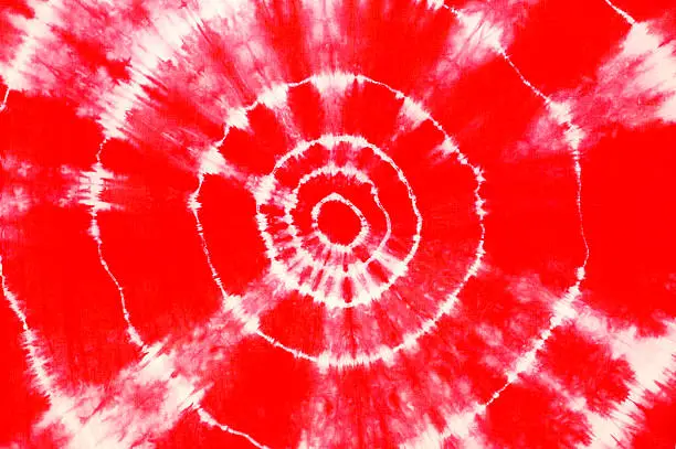 Brilliant red concentric circles in groovy tie dye.  Self-made print on the fabric.