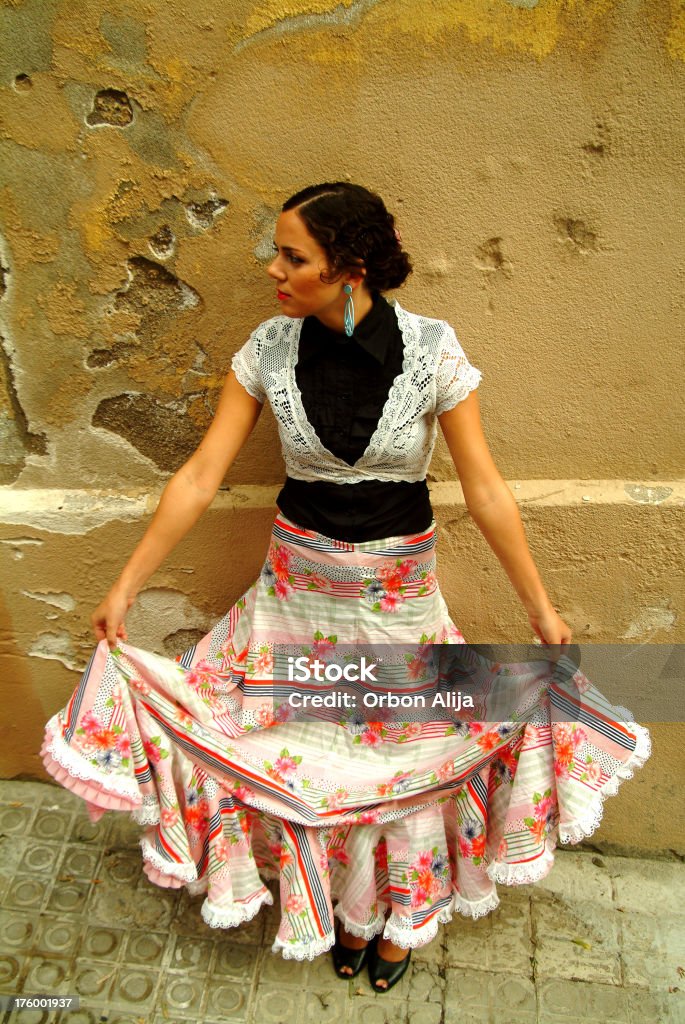 Dancing with myself Spanish female showing her skirt Flamenco Dancing Stock Photo