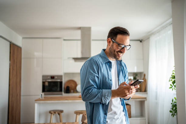 istock Portrait of a happy man using a mobile phone 1760019538