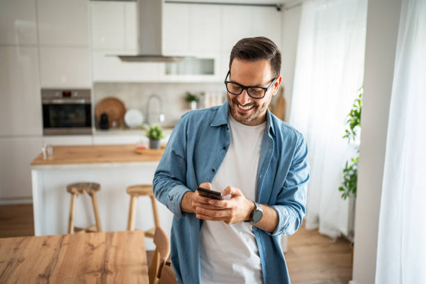 istock Portrait of a happy man using a mobile phone 1760020631