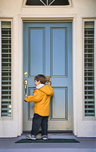 Knock on a Door A child knocking on a door.More Children Model Images mm1 stock pictures, royalty-free photos & images