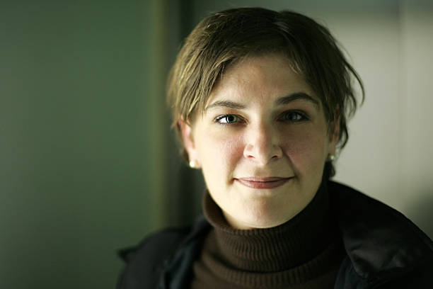 istock young smiling woman portrait 176002583