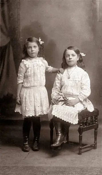 Old photograph of young sisters from the Victorian era.