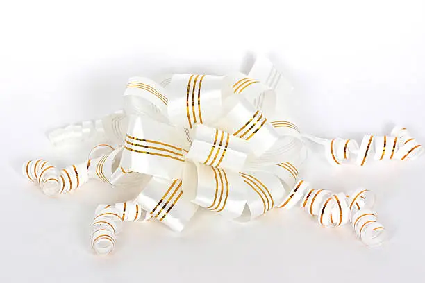 White with gold strips bow isolated on white.