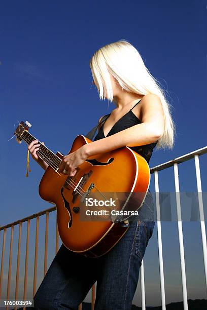 Playing By Myself 1 Stock Photo - Download Image Now - Acoustic Guitar, Activity, Adult