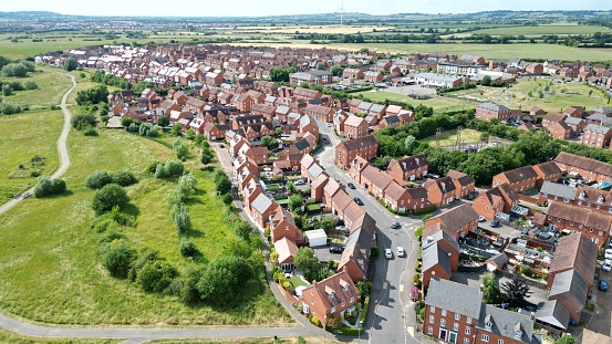 A bird's eye view of a quaint rural town, nestled in the countryside: Buckingham Park