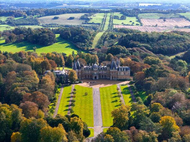 istock the house is surrounded by trees and lush green fields surrounded by trees 1760038777
