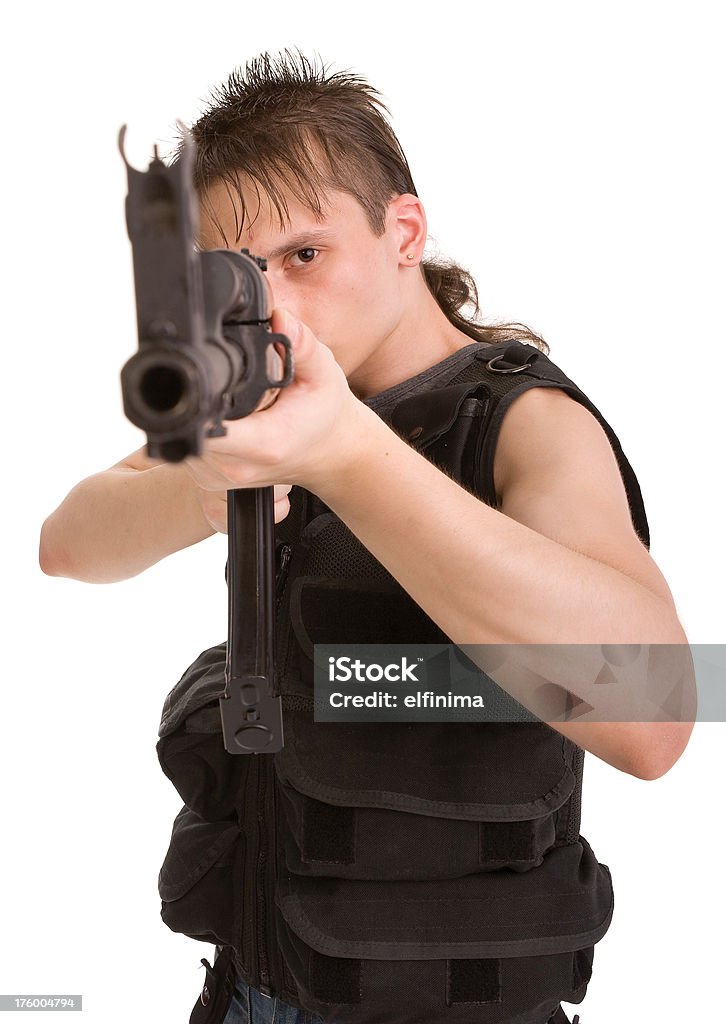 Young man aiming rifle Target Shooting Stock Photo