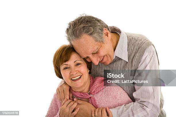 Senior Couple Embracing And Smiling Stock Photo - Download Image Now - 60-69 Years, 70-79 Years, Active Seniors