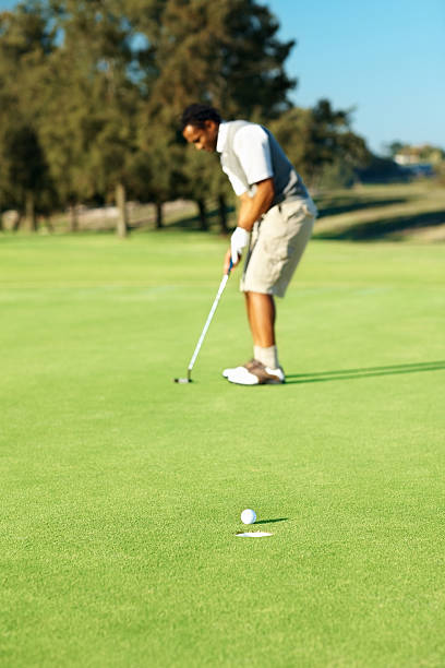 istock African American man playing a game of golf 176005654