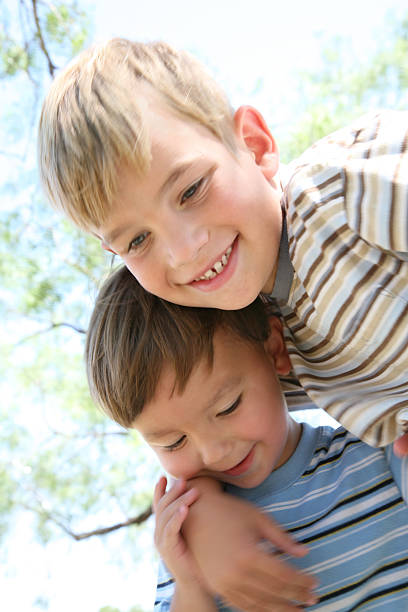 istock Two Happy Young Brothers Outside 176006030