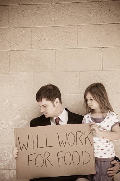 istock Unemployed Businessman with His Daughter 176006140