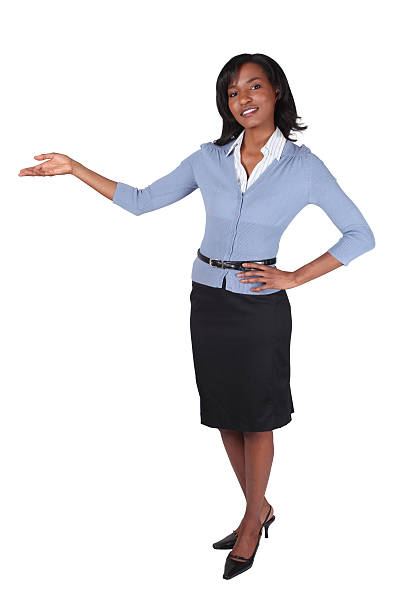 istock Businesswoman presenting with hand on hip 176006245