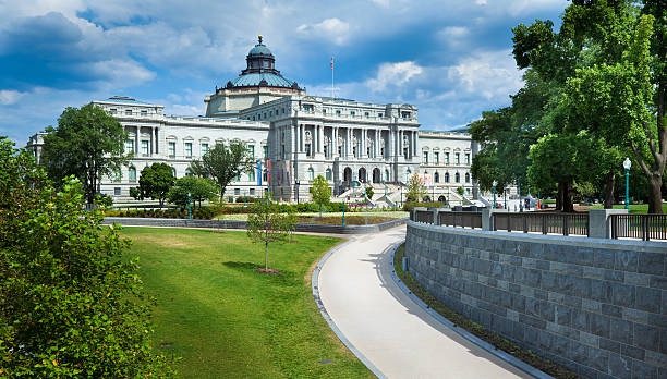 United States Library of Congress The Library of Congress in Washington with the walkway to the U.S. Capitol's Visitor Center in the foreground. library of congress stock pictures, royalty-free photos & images