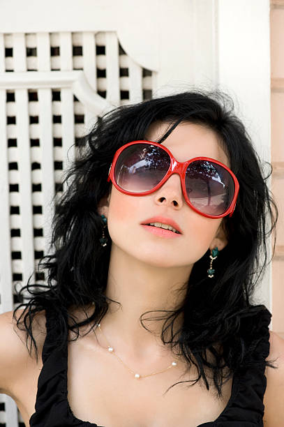 istock Beautiful woman with red sunglasses 176007292
