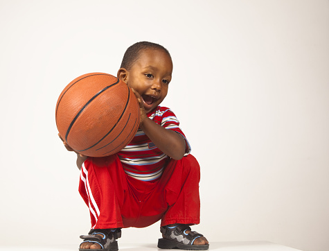 Little sweet boy posing in studio.