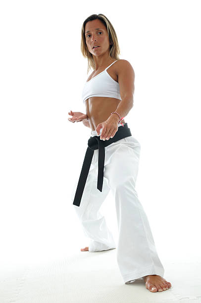 tae kwon делают элементы - martial arts women tae kwon do black belt стоковые фото и изображения