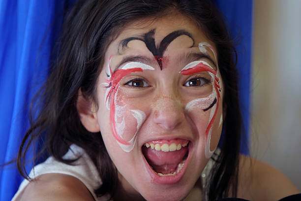 istock Girl with face paint 176007988
