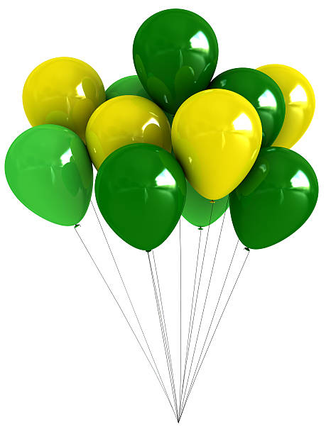 Green and yellow balloons bunch stock photo
