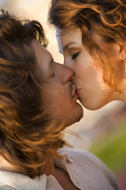 istock Kissing Couple 176009247