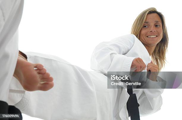 Extending The Side Kick Stock Photo - Download Image Now - Adult, Adults Only, Black Belt