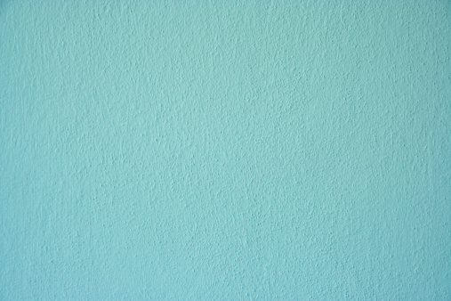 Rough rendered turquoise wall texture