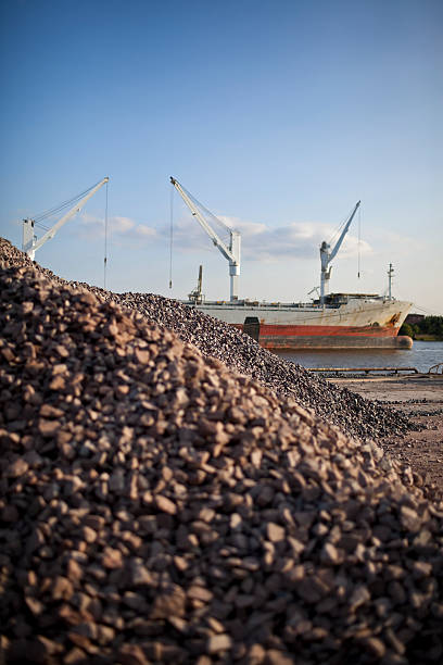 istock gravel dunes and container ship, port hamburg 176010356