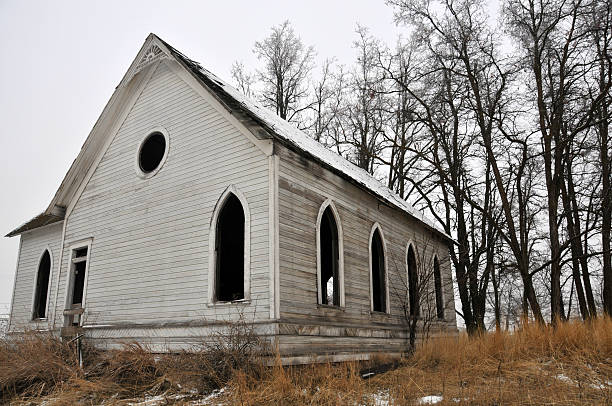 istock Dilapidated Abandoned Church in Winter 176010609