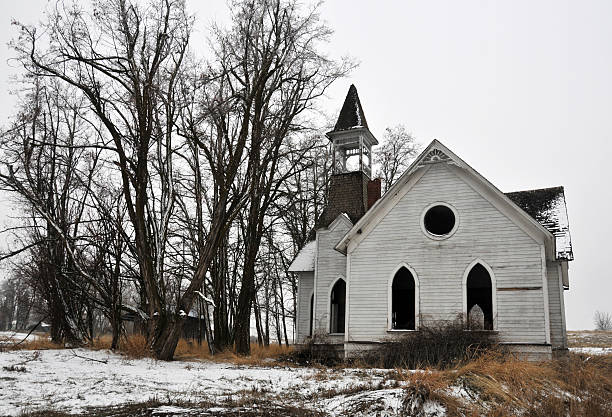 istock Dilapidated Abandoned Church in Winter 176010610
