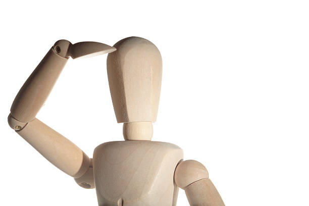 istock Wooden figure looking out 176010843