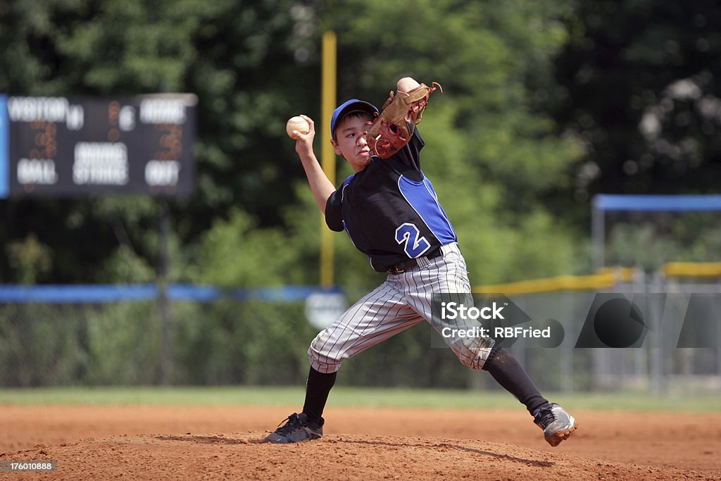 Pitcher a boy pitching in a baseball game Baseball - Ball Stock Photo