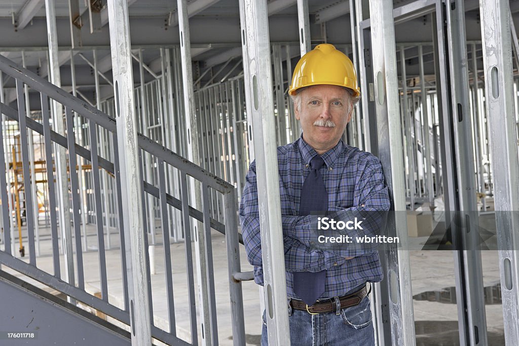Hombre trabajando en el sitio de construcción (XXL - Foto de stock de Acero libre de derechos