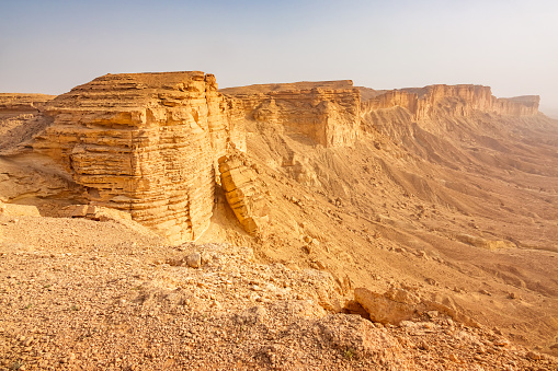 Dramatic cliffs at The Edge of the World (Jebel Fihrayn), a wild escarpment northwest of Riyadh, Saudi Arabia.