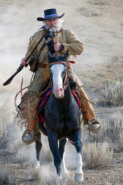 istock Cowboy on horse 176011823