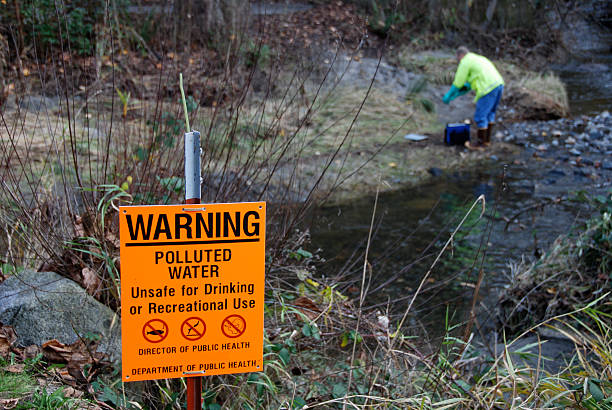 istock Scientist measuring pollutants in stream 176011965