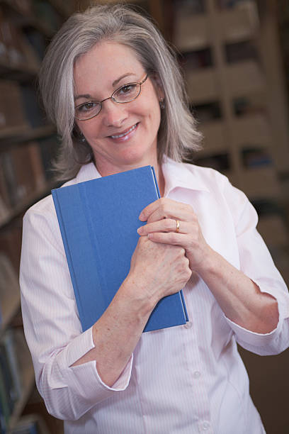 istock Woman in Library Series 176012086
