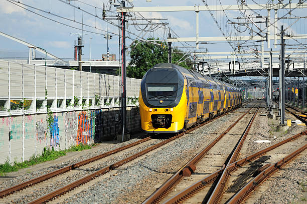 istock Railway tracks and train in the Netherlands 176012384