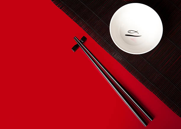 istock Asian bowl, straw mat and chopsticks 176012914